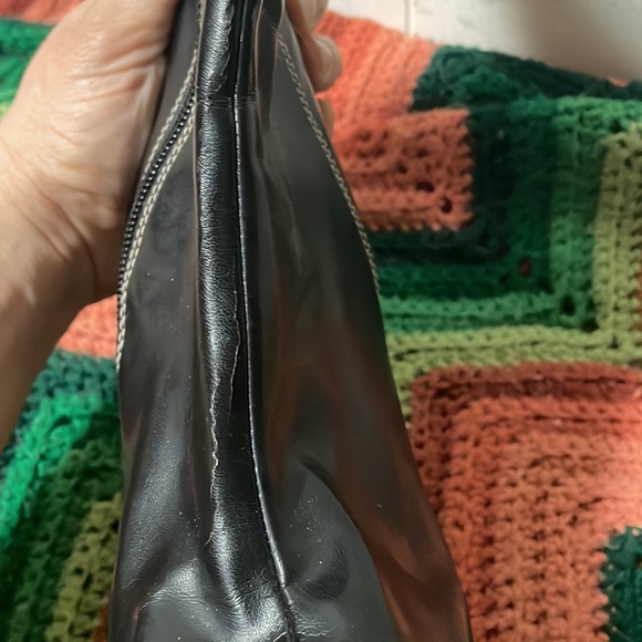 Cute heeled boots. They have a slight crack in the crease. - Picture 2 of 3